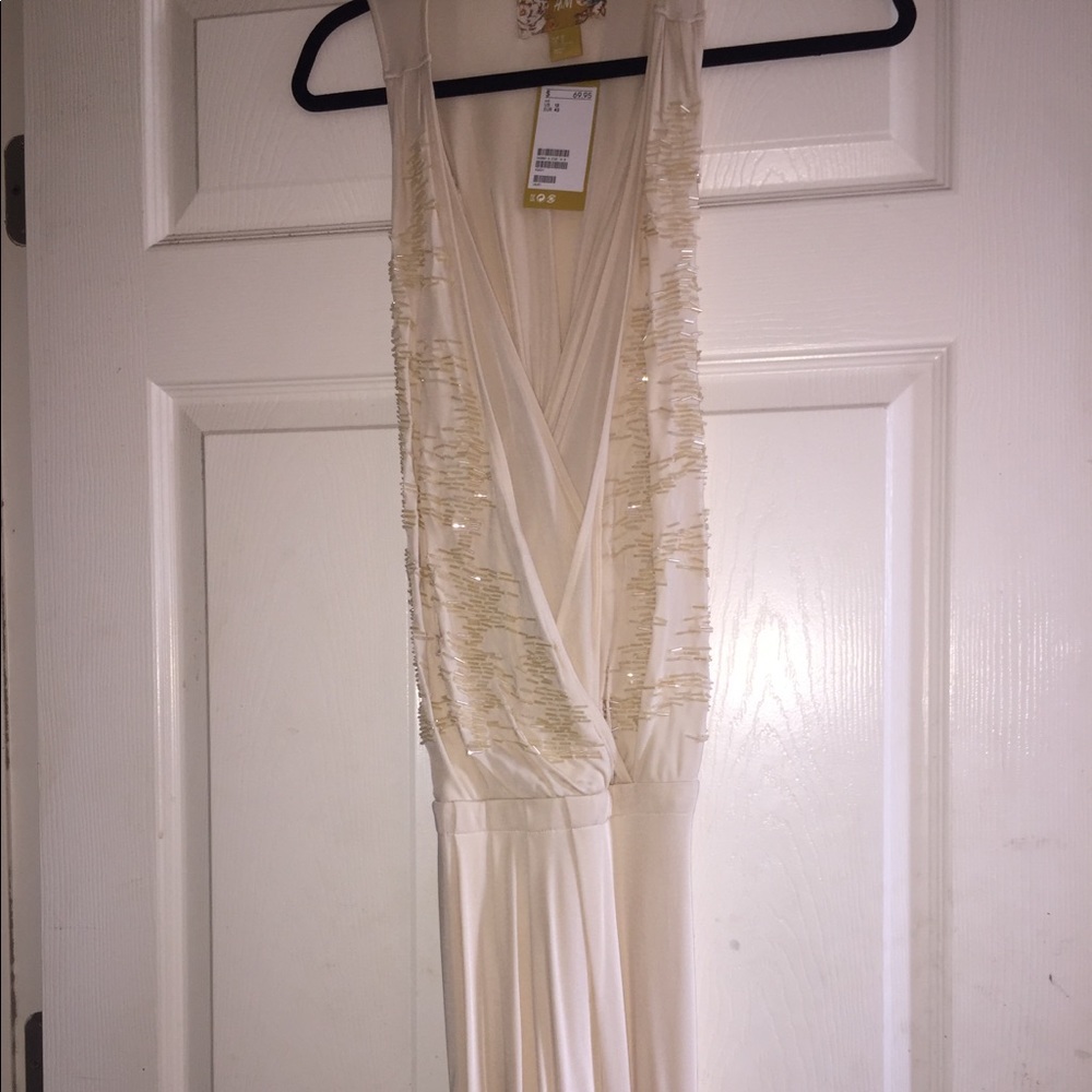 H&M cream floor length dress. Beaded front. NWT.